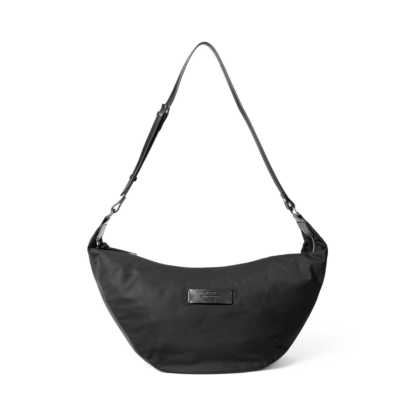 Black shoulder bag with a visible Mads Norgaard label on a white background