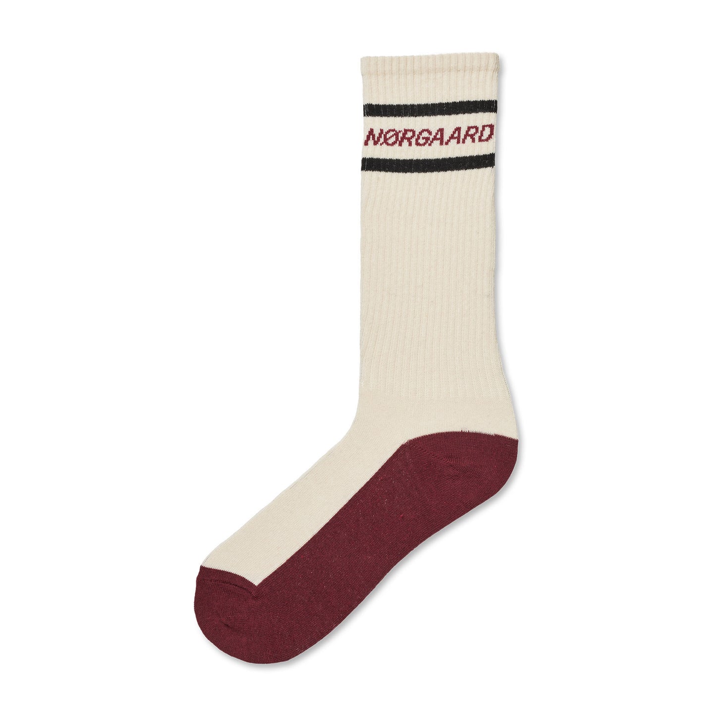 An off white sock with burgundy heel and sole and 'Norgaard' branding on a white background