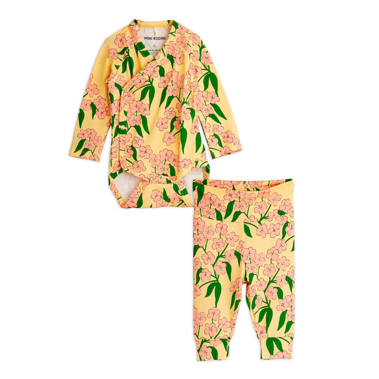 Floral baby set with long-sleeve body and pants on a white background