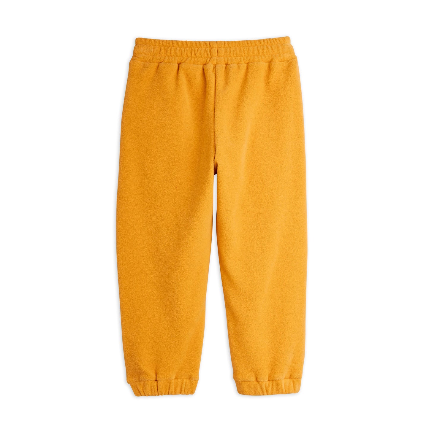 Yellow sweatpants on a white background viewed from the back