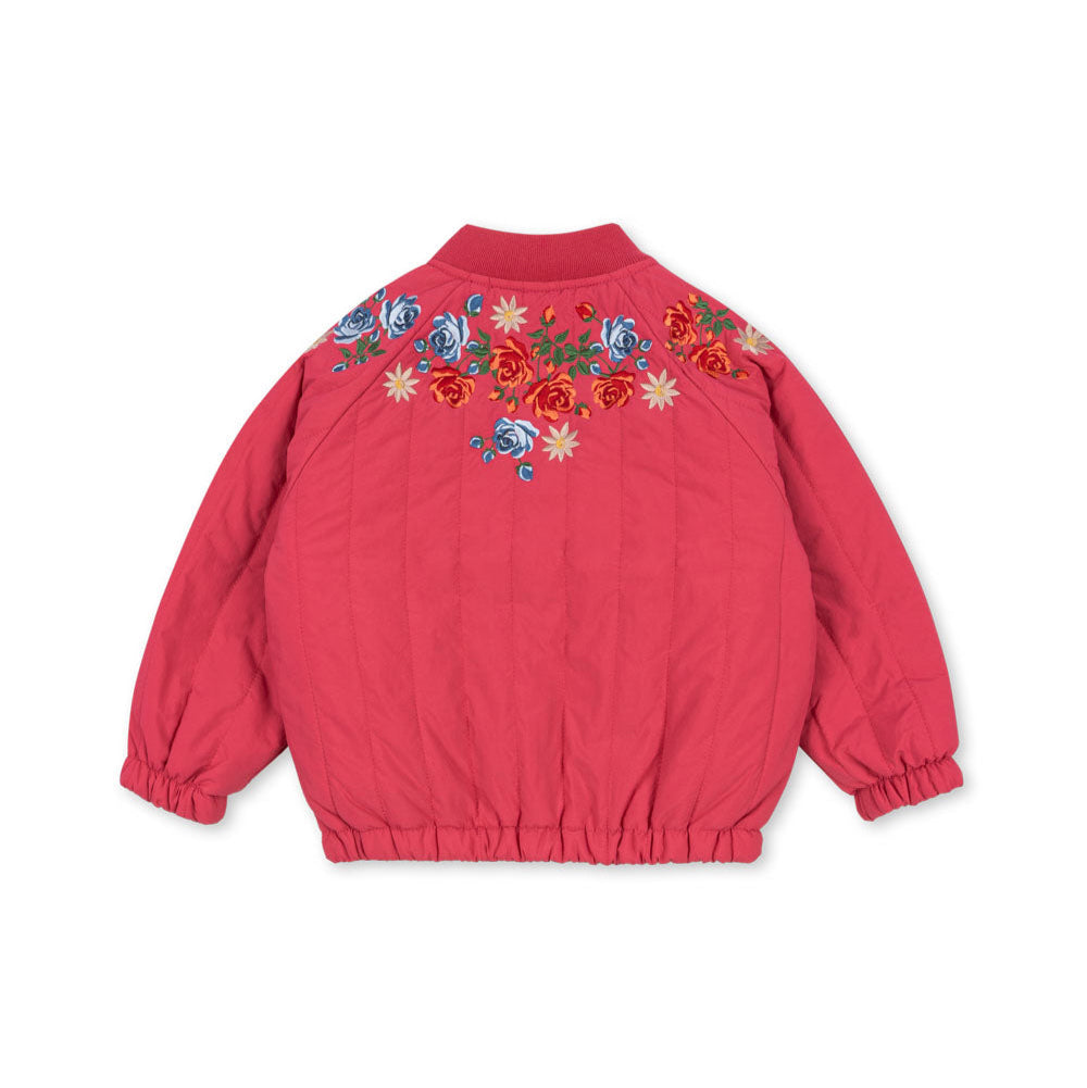 Red jacket with floral embroidery on a white background