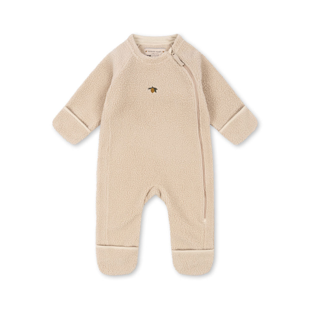 Beige baby onesie on a white background