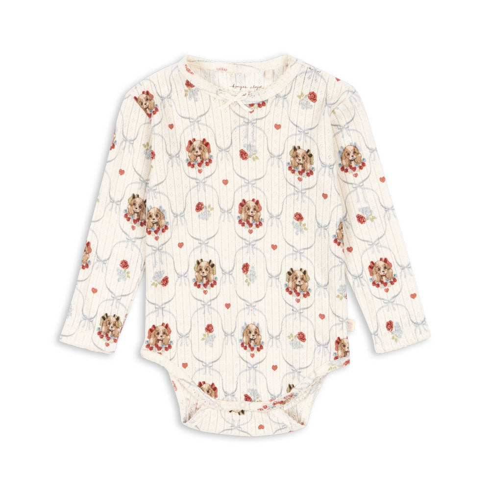 Floral-patterned baby onesie on a white background
