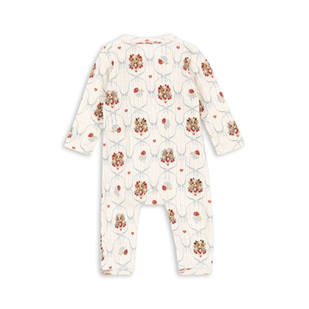 Baby onesie with floral pattern on a white background