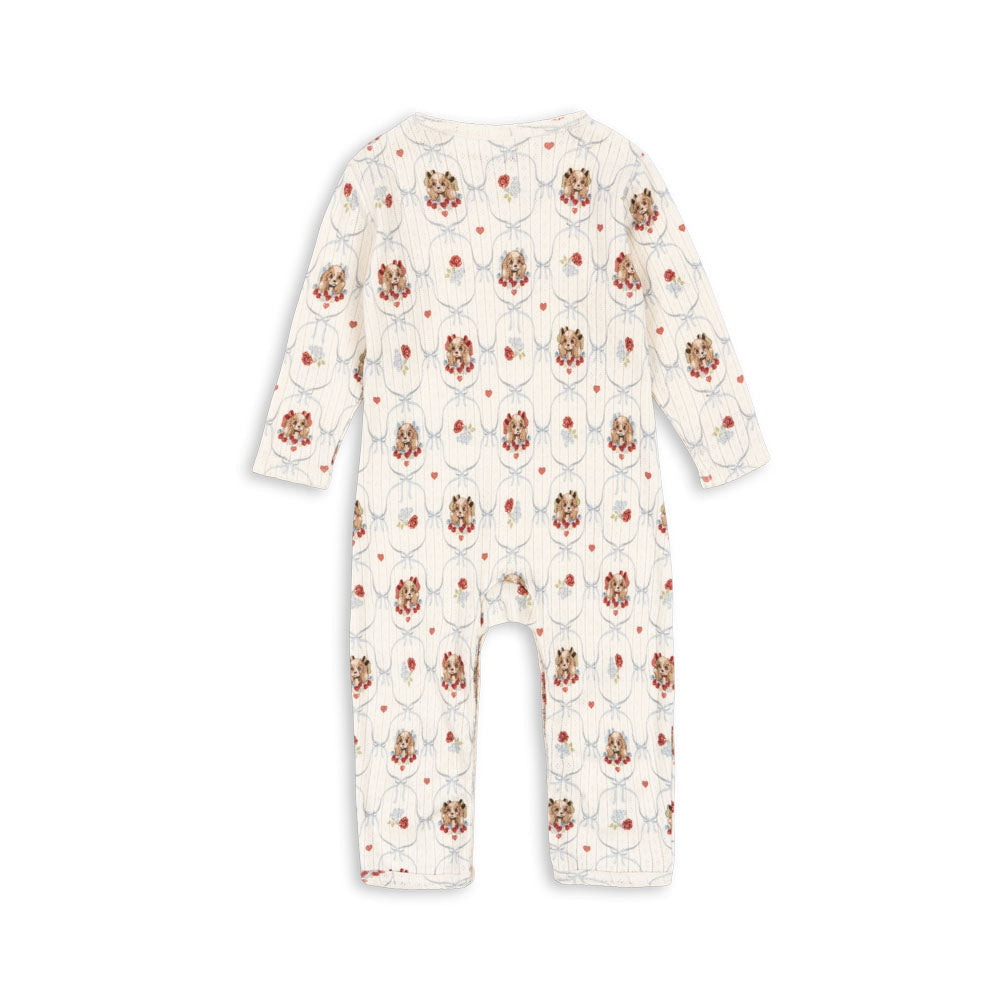 Baby onesie with bear pattern on a white background
