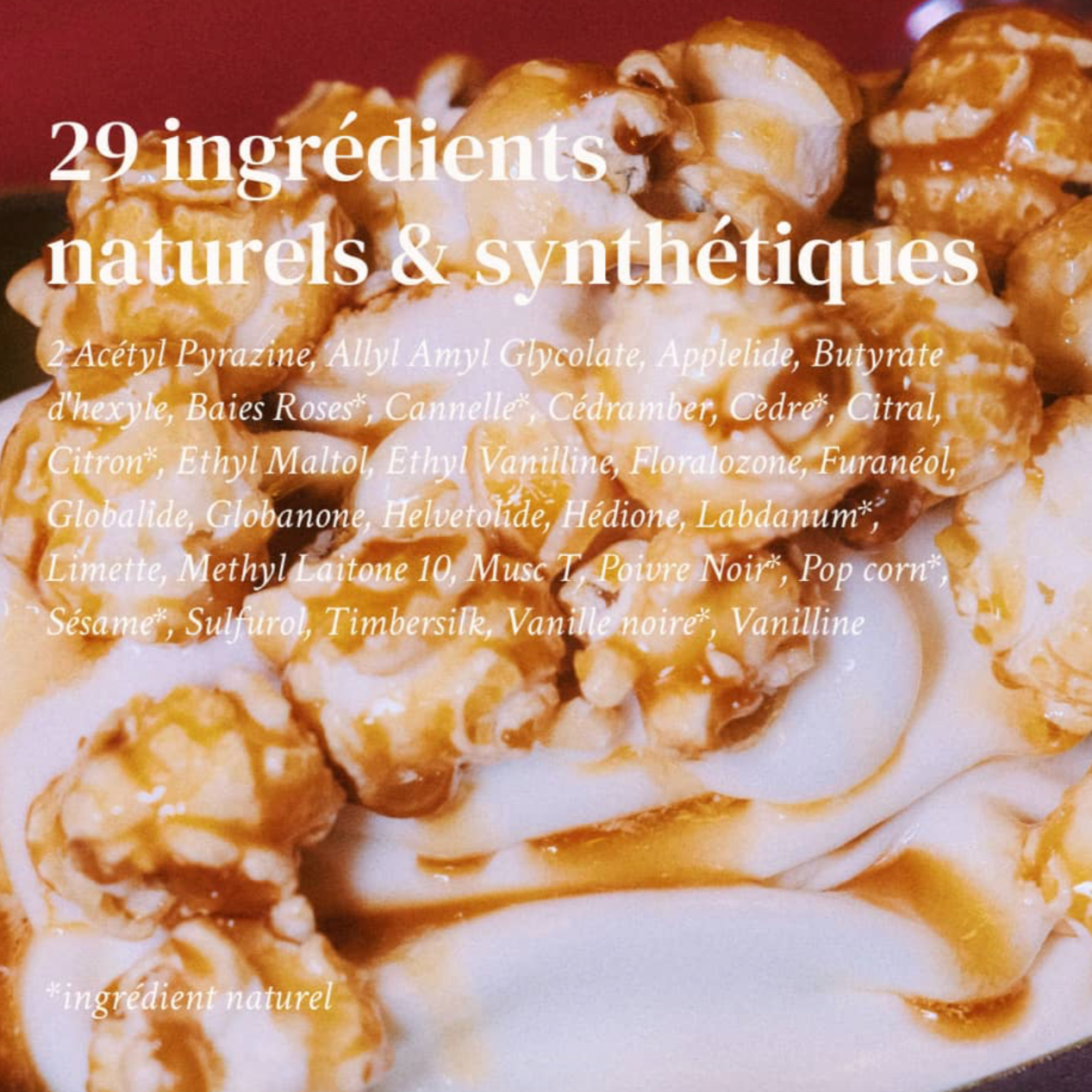 An image of the list of the 29 ingredients that are used to create this perfume, written in French, against the backdrop of an image of popcorn with golden syrup on it.