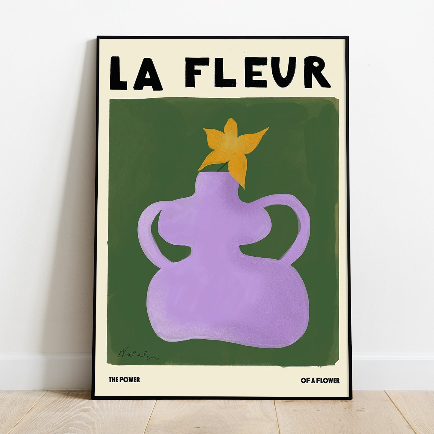A Natalia Bagniewska La Fleur Print which has a green background. There is a lilac flower pot and the flower inside is yellow. It say “la Fleur” which means the flower is French at the top of the print . Beneath the green background in black on the left hand side it says The Power and on the right it says Of A Flower.