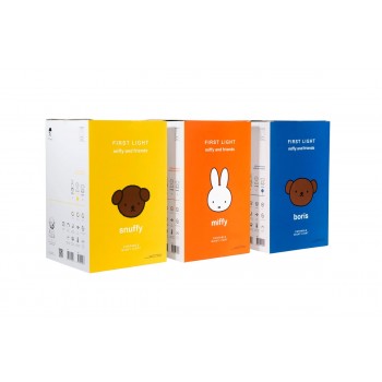 The rear views of three boxes of First Light Lamps. The yellow box with the text, Snuffy and a teddy bear icon. Orange box with the text Miffy and a rabbit on it. The blue box has the text Boris with a teddy bear on it. The boxes are against a white background.