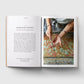 Open book showing a page with text and an image of hands working with paper.