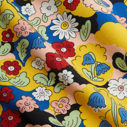 Colorful floral pattern with various flowers on a black background
