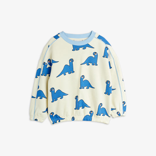 Children's sweater with blue dinosaur patterns on a white background