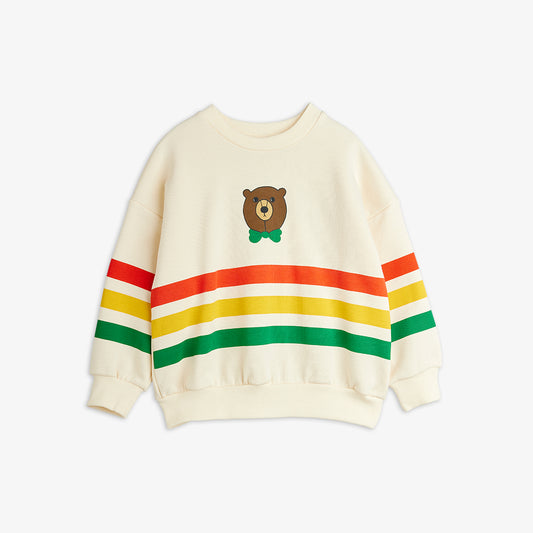 Cream-colored sweatshirt with a bear graphic and colorful stripes on a white background