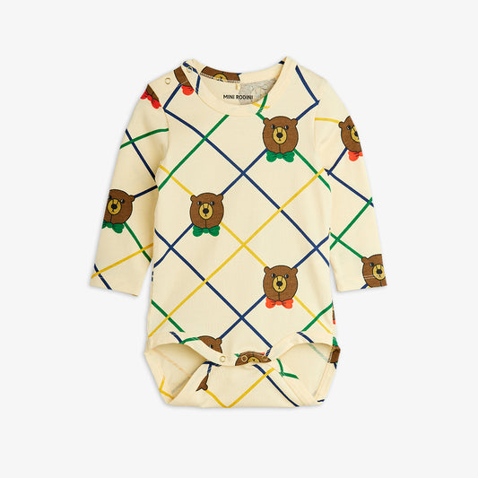 Baby romper with teddy bear pattern on a white background
