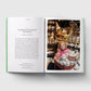 Open book showing a photo of a woman in a market and text about Camden Passage Market.