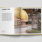 Open book showing a design project for a kids' club with interior elements.