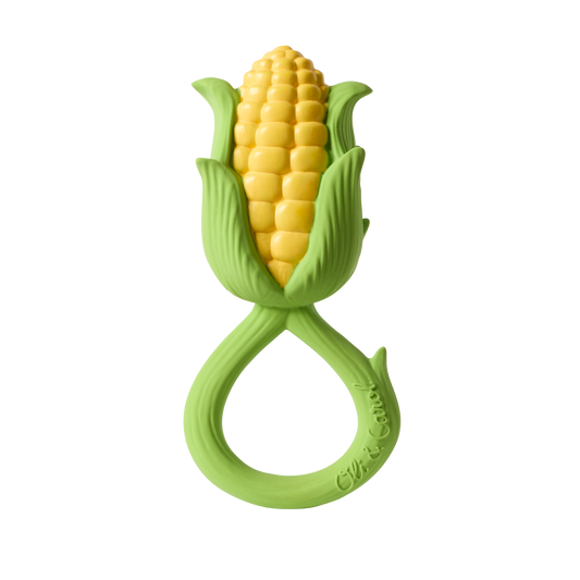 Corn-shaped teether with green husk on a white background