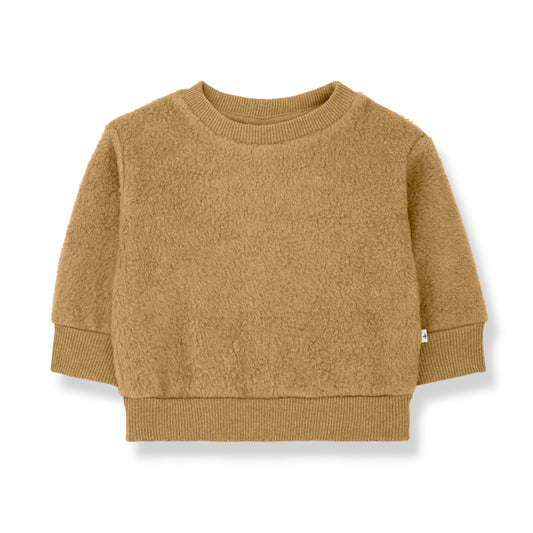 a fleece sweat shirt in a warm light brown colour with long sleeves and a round neck. and all cuffs and the neck lined with ribb edges