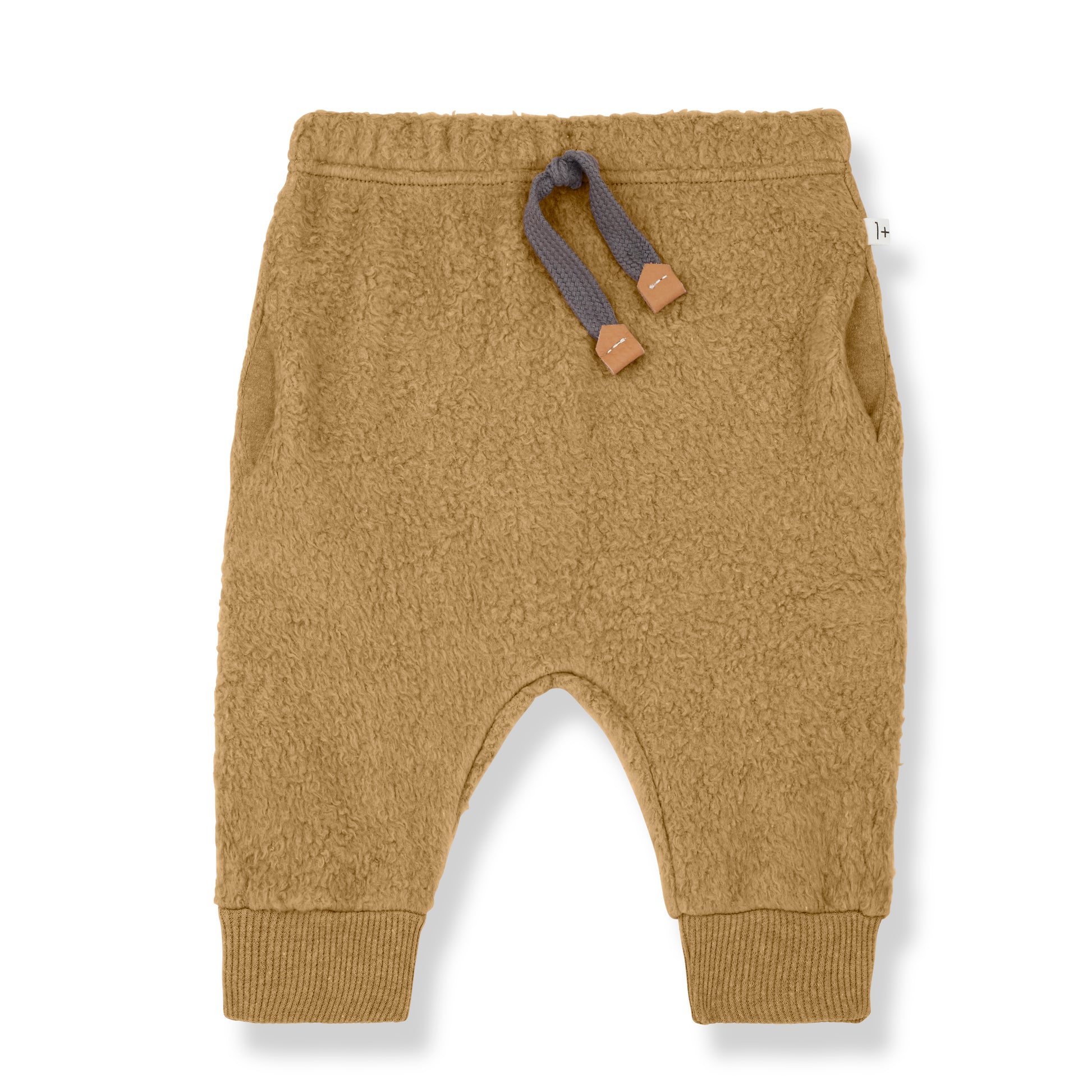 a pair of baby fleece warm light brown jogging pants with a low crotch and ribbed cuffs and elasticated waist band with a decorative tie with tan tabs on the end