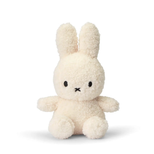 A Miffy cream recycled teddy soft toy in the colour cream. This Miffy has black eyes and nose. It is 23 cm in height. The background is white. This Miffy is made with recycled filling. 