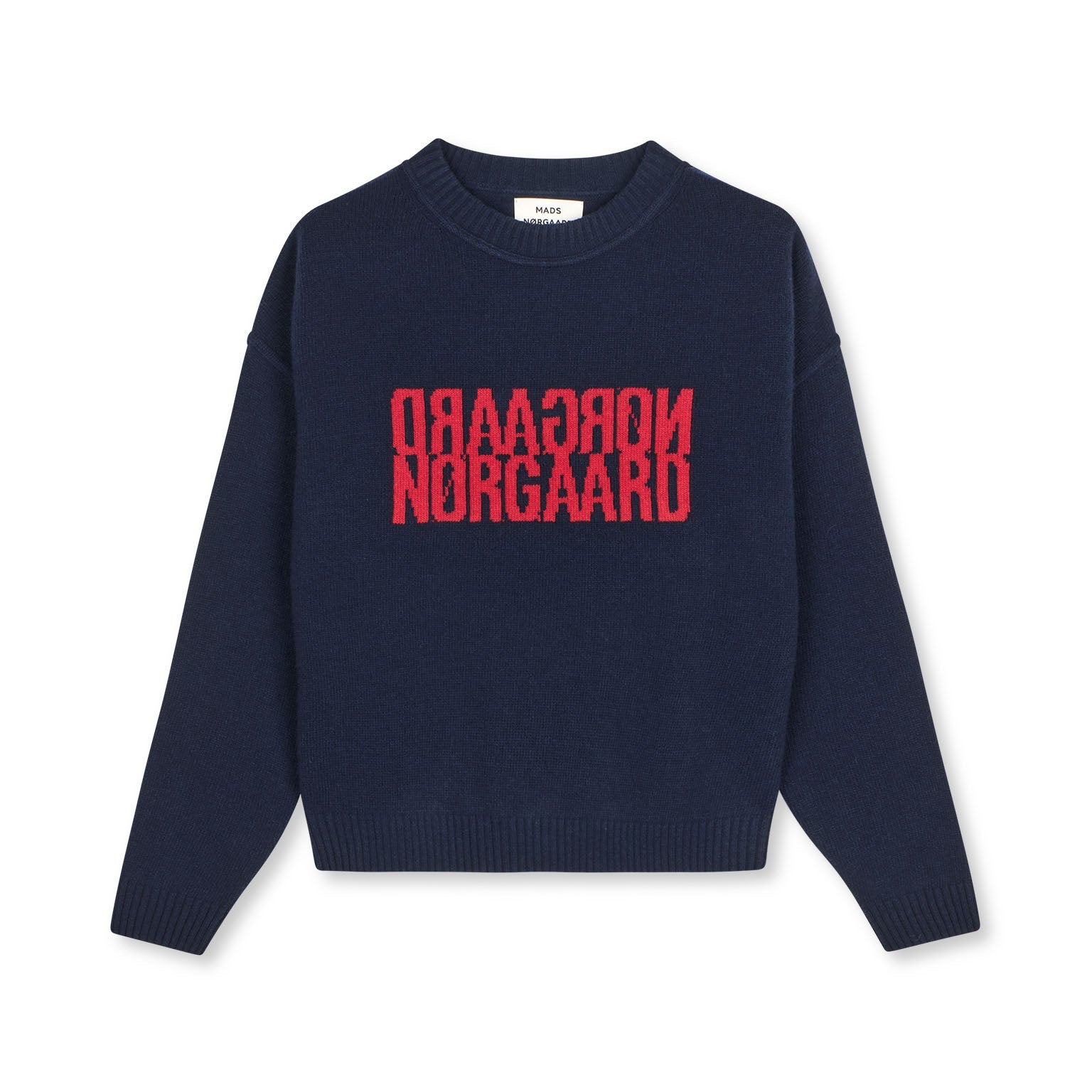 Navy sweater with red text on a white background