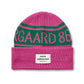 Pink and green beanie with 'Mads Nørgaard 86' branding on a white background