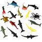 Collection of various toy sea creatures on a white background