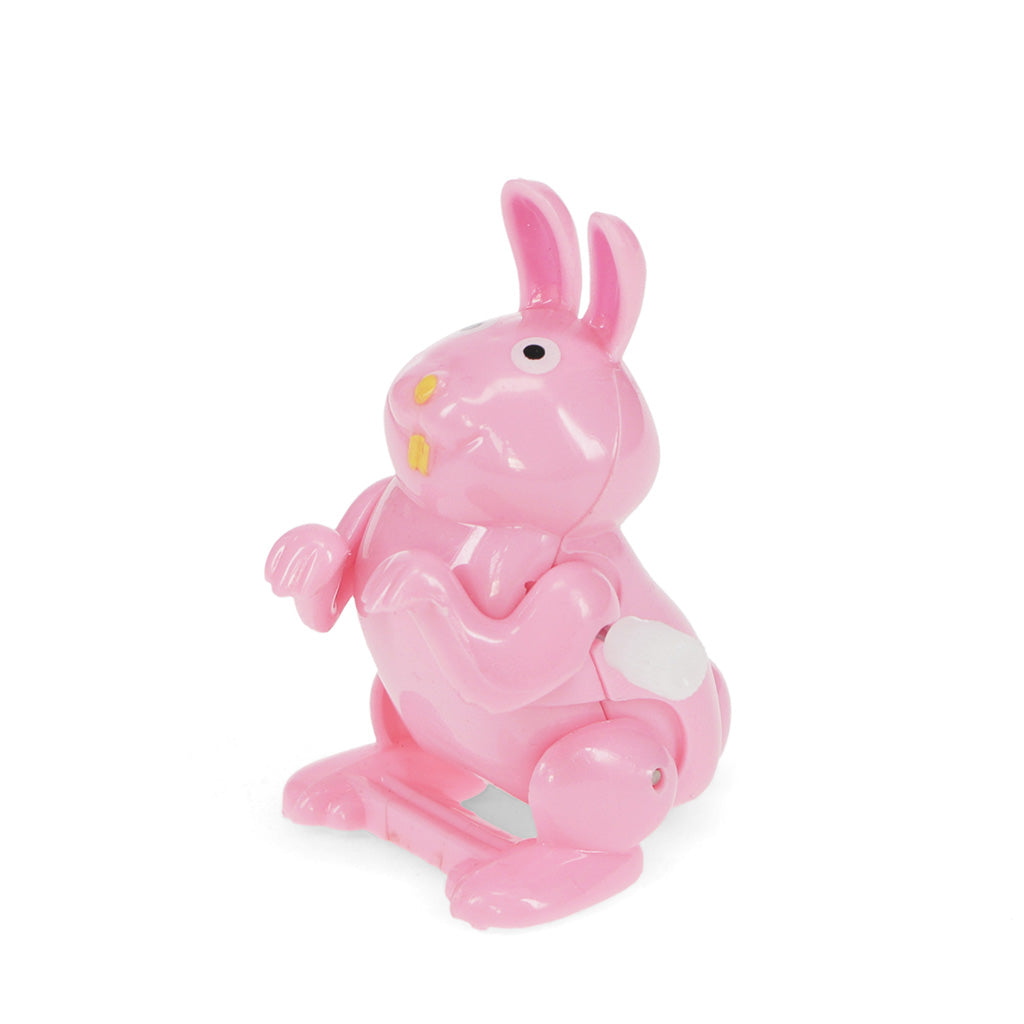 Pink rabbit-shaped toy on a white background