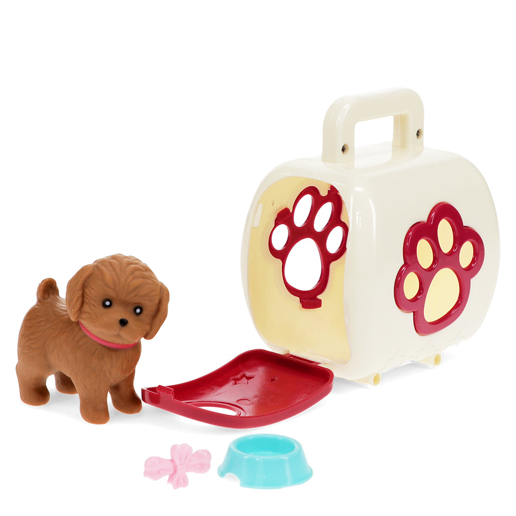 Toy dog with a carrier and accessories on a white background