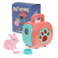 Toy pet carrier with pink rabbit, blue paw print, and 'Pet Home' packaging on a white background