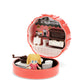 Toy set with a miniature coffee shop scene and a doll inside a red case.