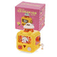 Yellow wind-up ice cream van toy with pink packaging on a white background