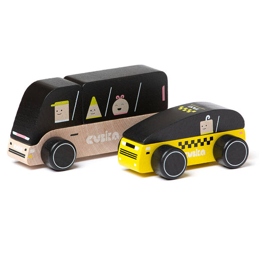 Wooden toy bus and taxi on a white background