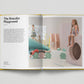 Open book showing a page titled 'The Brutalist Playground' with images of children playing on playground equipment.