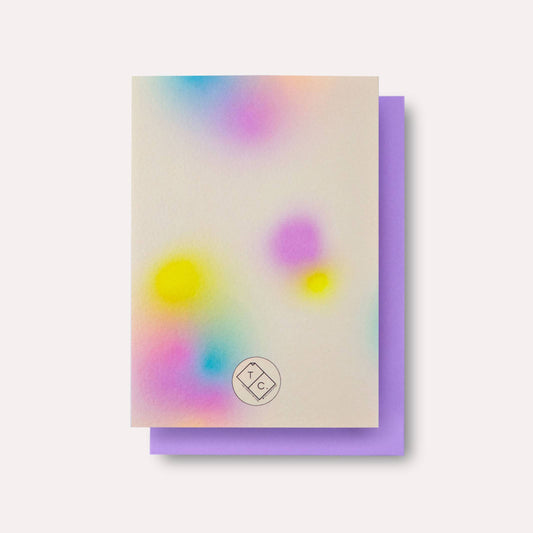 Greeting card with colorful abstract design on a white background