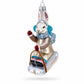 Sledding Bunny Glass Christmas Ornament