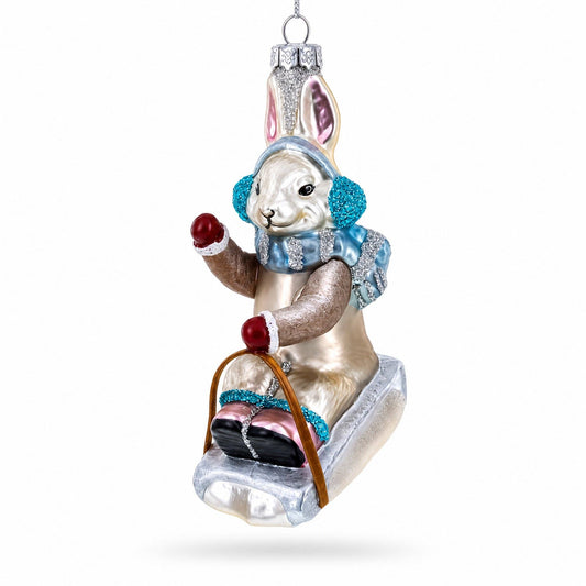 Sledding Bunny Glass Christmas Ornament