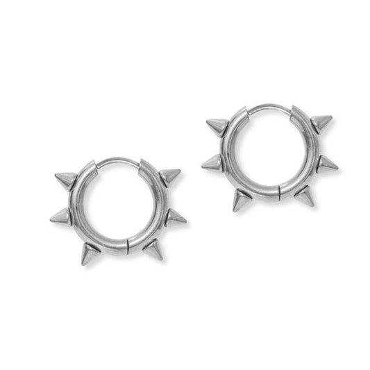 Pair of silver hoop earrings with spike details on a white background