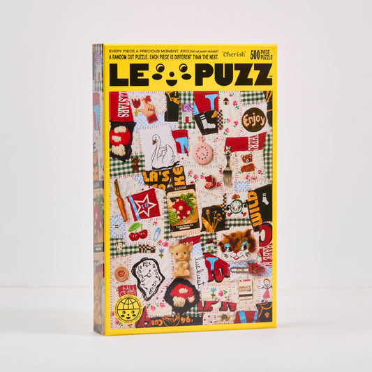 LE PUZZ puzzle box with colorful design on a white background