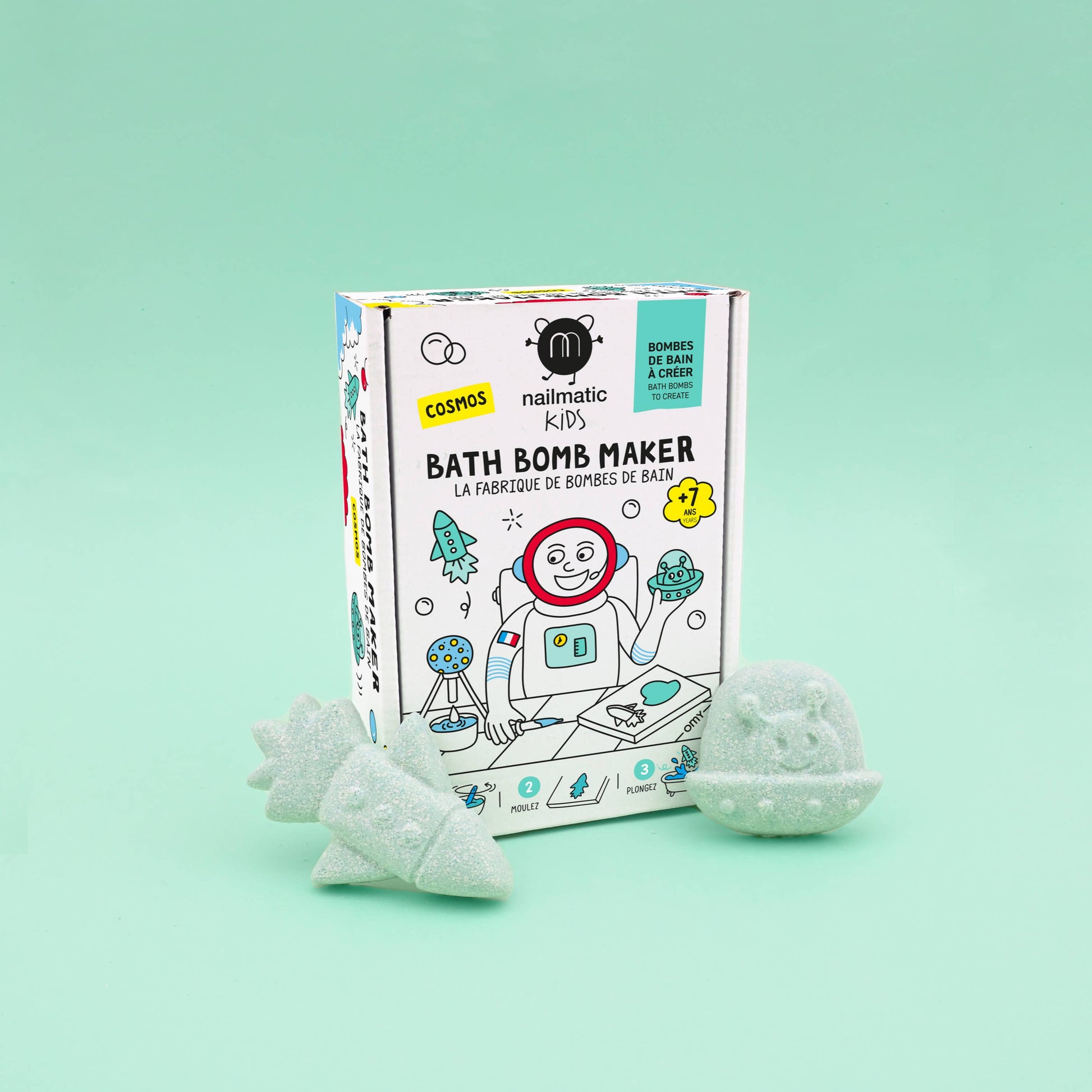 Bath bomb maker kit with bath bombs on a light green background