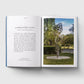 Open book with text on one page and an image of a sculpture on the other, set against a white background.