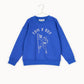 Blue sweatshirt with white graphics and text on a hanger against a white background