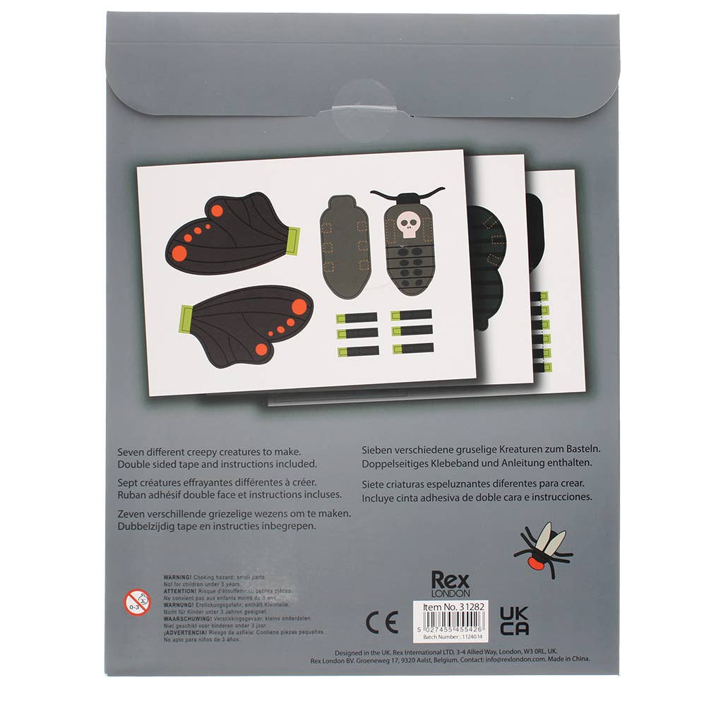 Packaging of craft kit with illustrations of creatures and text on a gray background