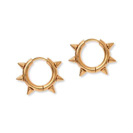 Gold hoop earrings with spike details on a white background