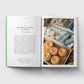Open book with text and image of Chiswick Cheese Market on a white background