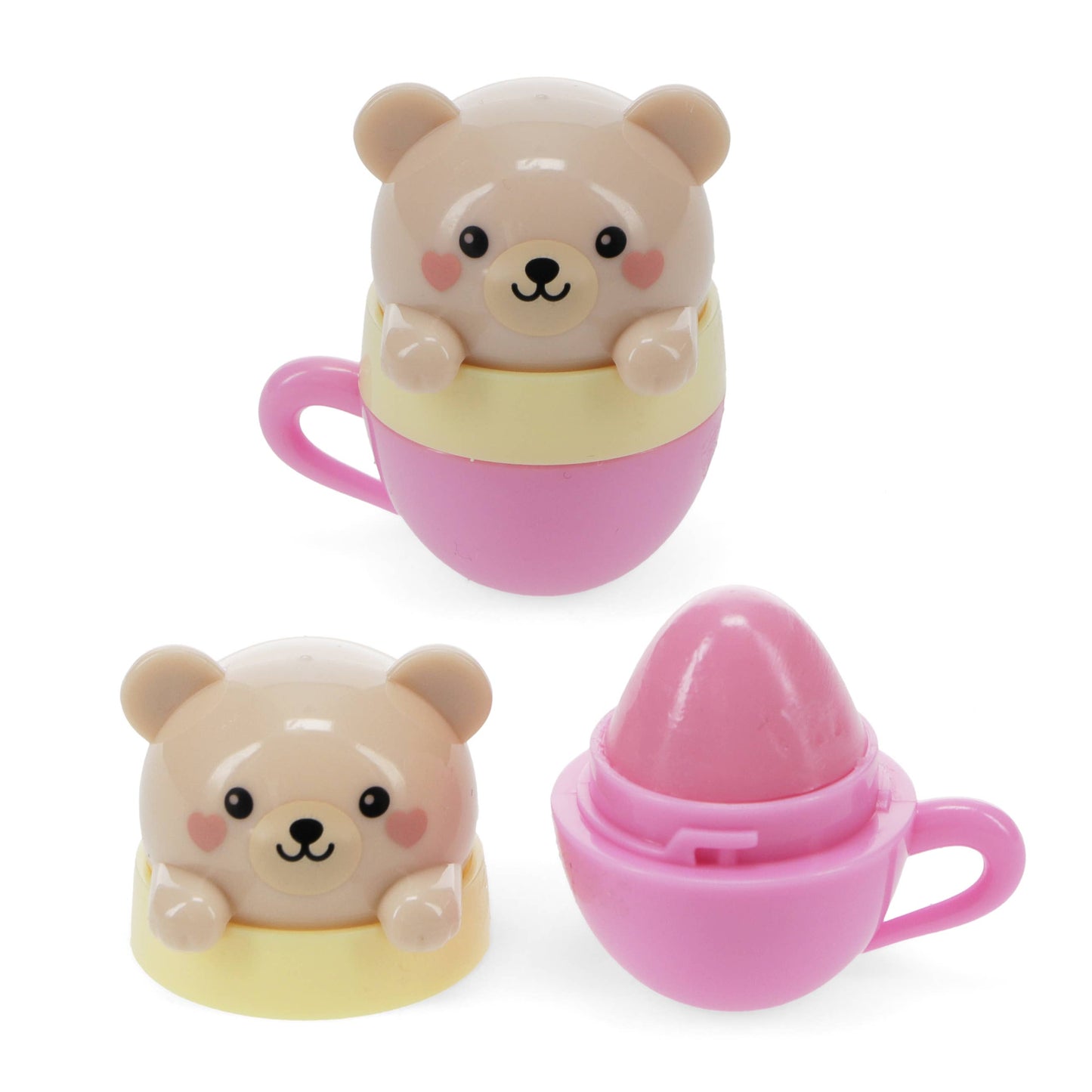 Toy bear in a pink cup on a white background