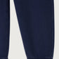 Close-up of the American Vintage Kids Izubird Joggers in vintage navy, showcasing the ribbed cuff detailing and soft cotton fabric texture.