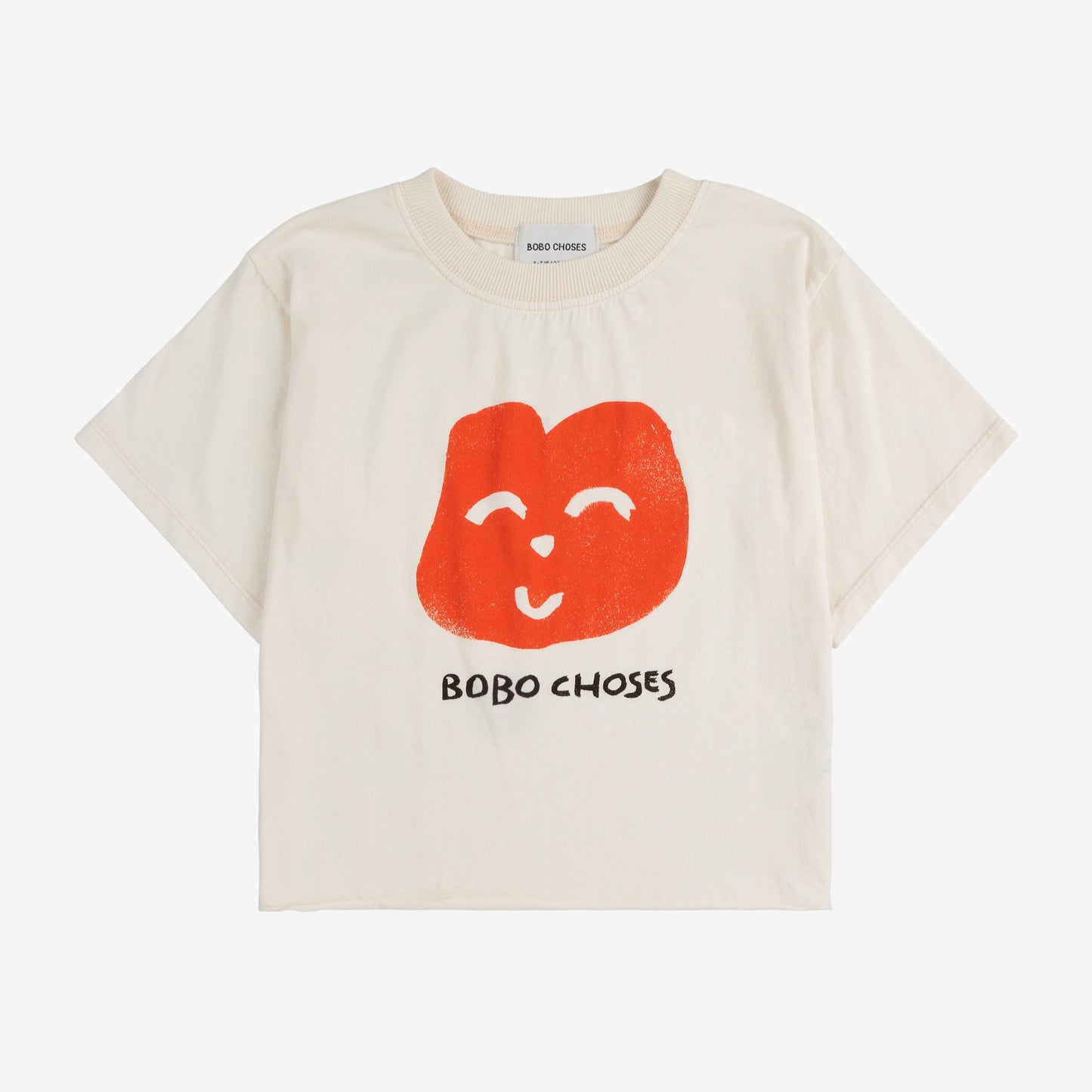 Bobo Choses short-sleeve T-shirt in an off-white shade, featuring a bold red smiling face graphic and 'BOBO CHOSES' text in a playful, hand-drawn style. Designed with a relaxed fit, ribbed crew neckline, and a soft cotton fabric for everyday comfort.