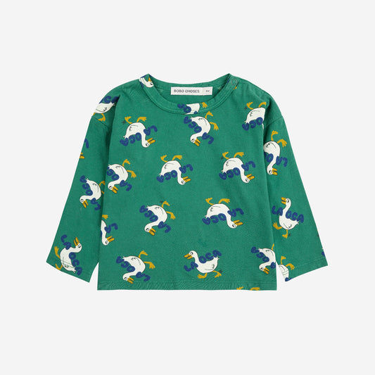 Green long-sleeve shirt with duck pattern on a white background