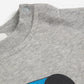 Gray sweater with a blue and black design on a white background