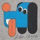 Gray shirt with a colorful dog graphic and 'Bobo Choses' branding